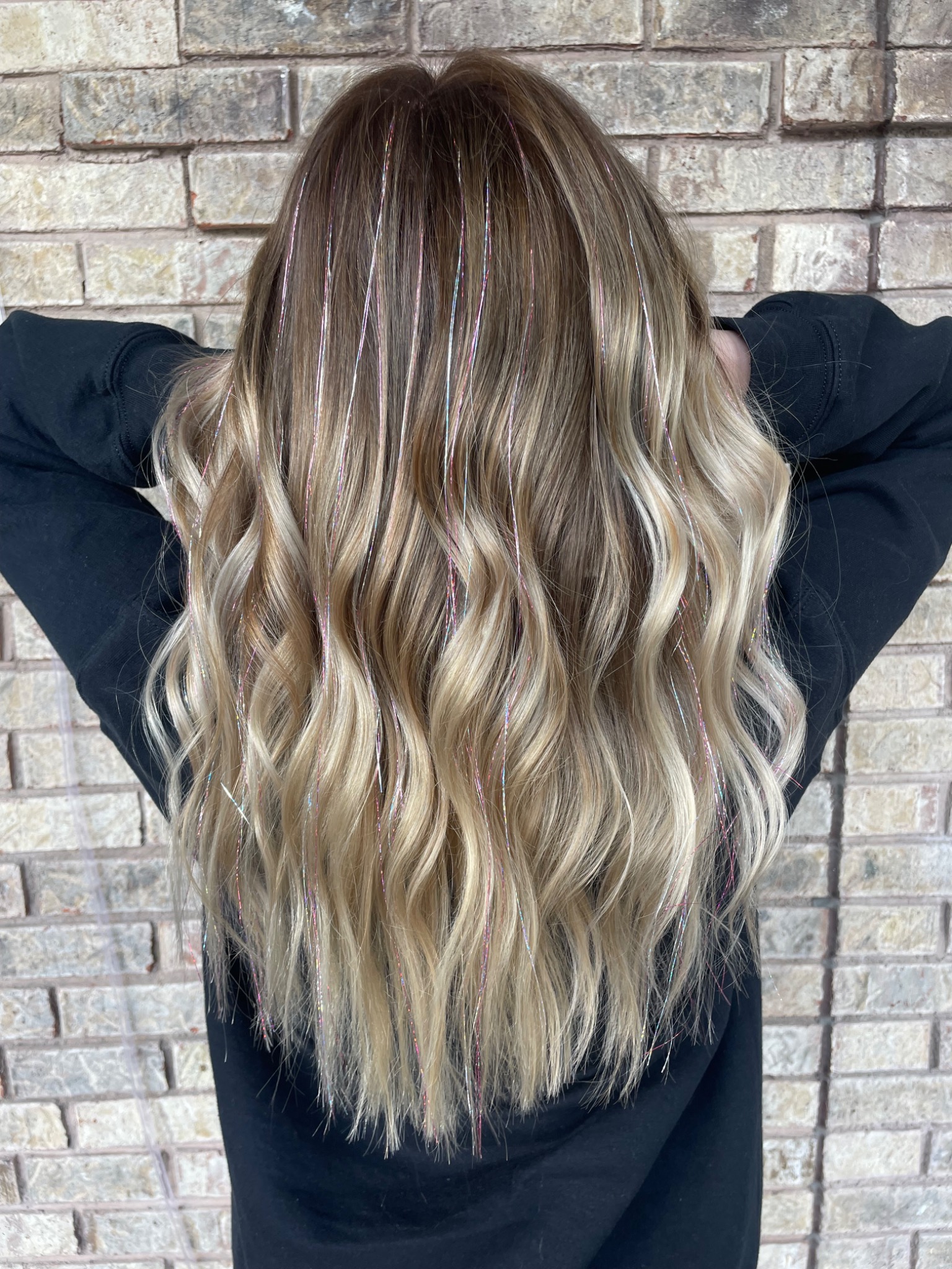 Long dimensional blonde hair with sparkle accents by Hair by Maddie Rose