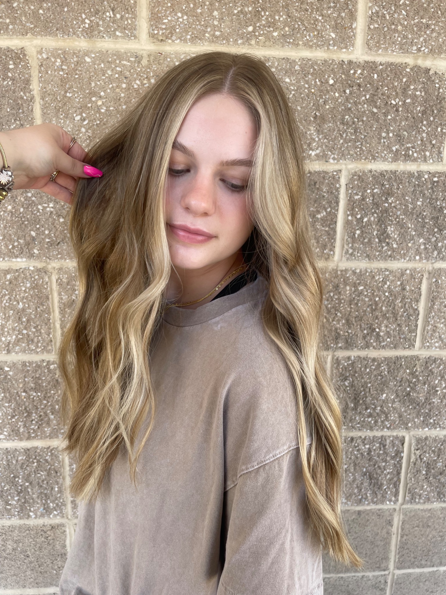Long lived-in blonde color by Hair by Maddie Rose